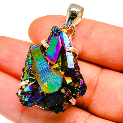 Iridescent druzy quartz pendant on 925 sterling silver bail, shown in hand