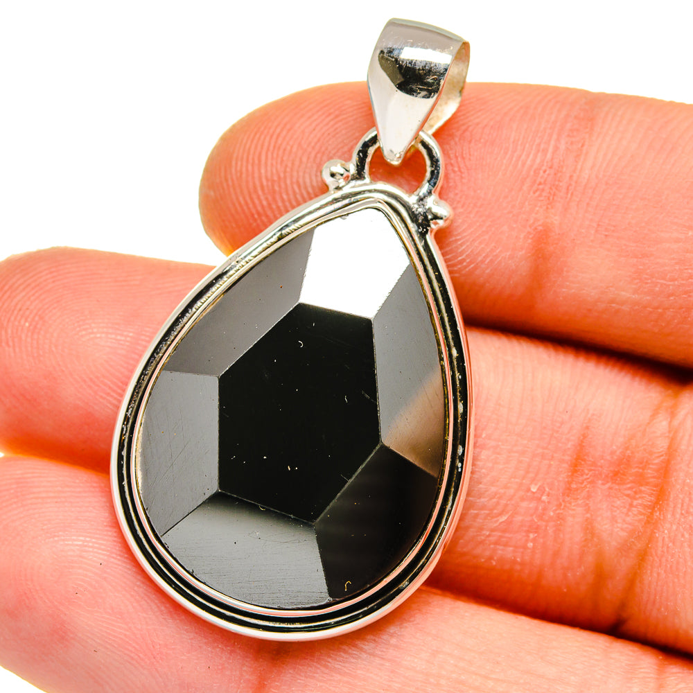Faceted hematite teardrop pendant in sterling silver with top bail