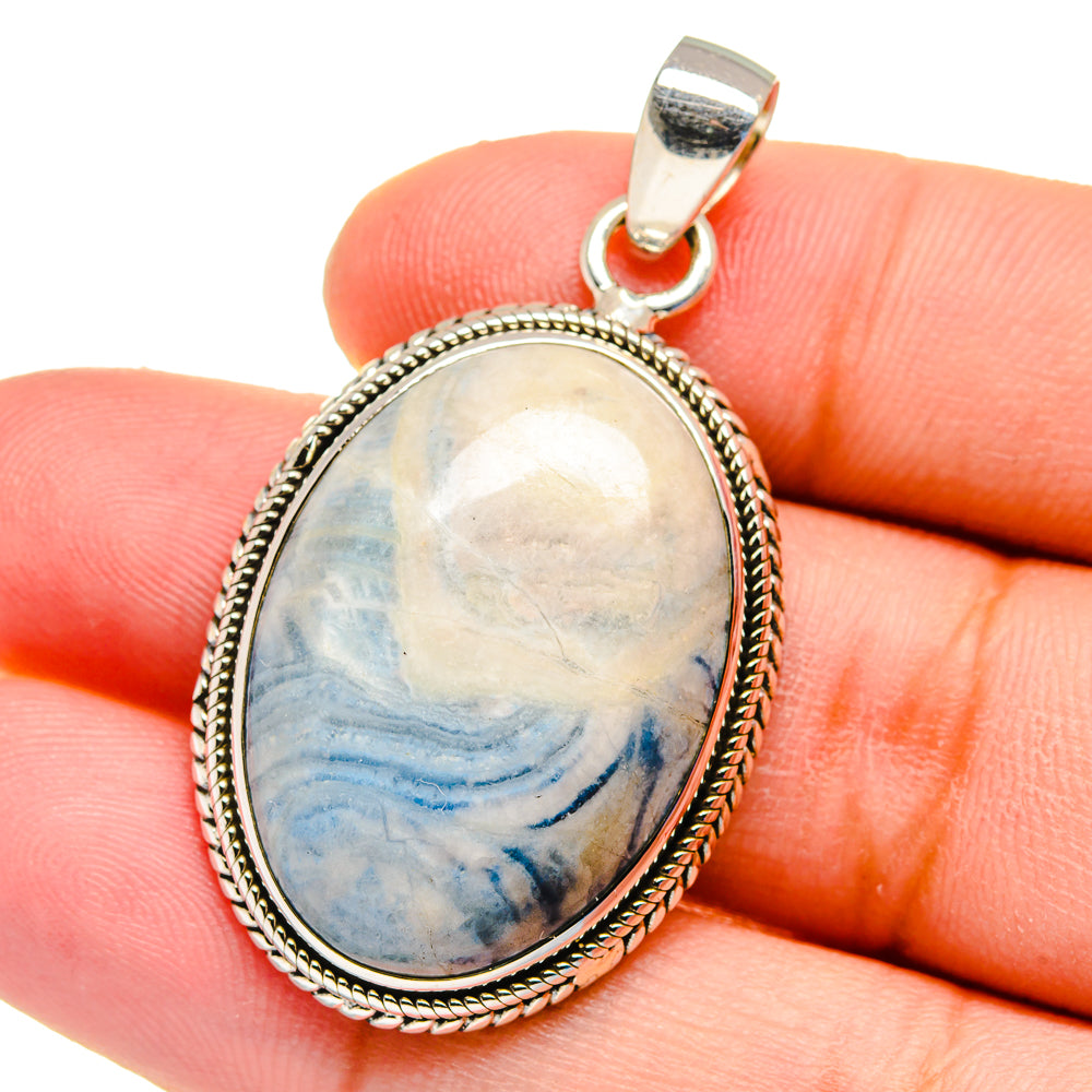 Blue scheelite cabochon oval pendant, braided silver border and round bail, 925