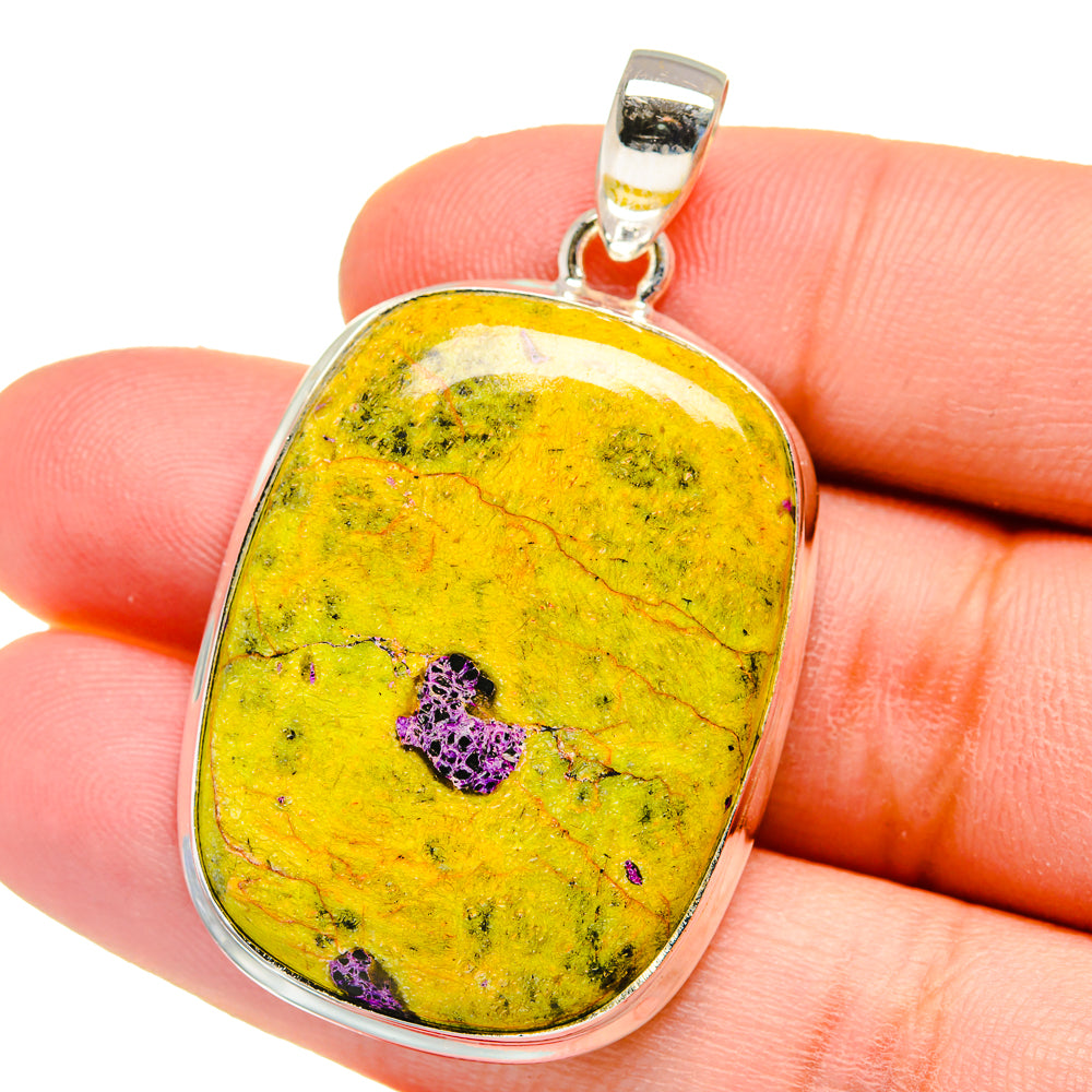 Oval stichtite pendant in yellow stone with purple specks, silver bezel and bail