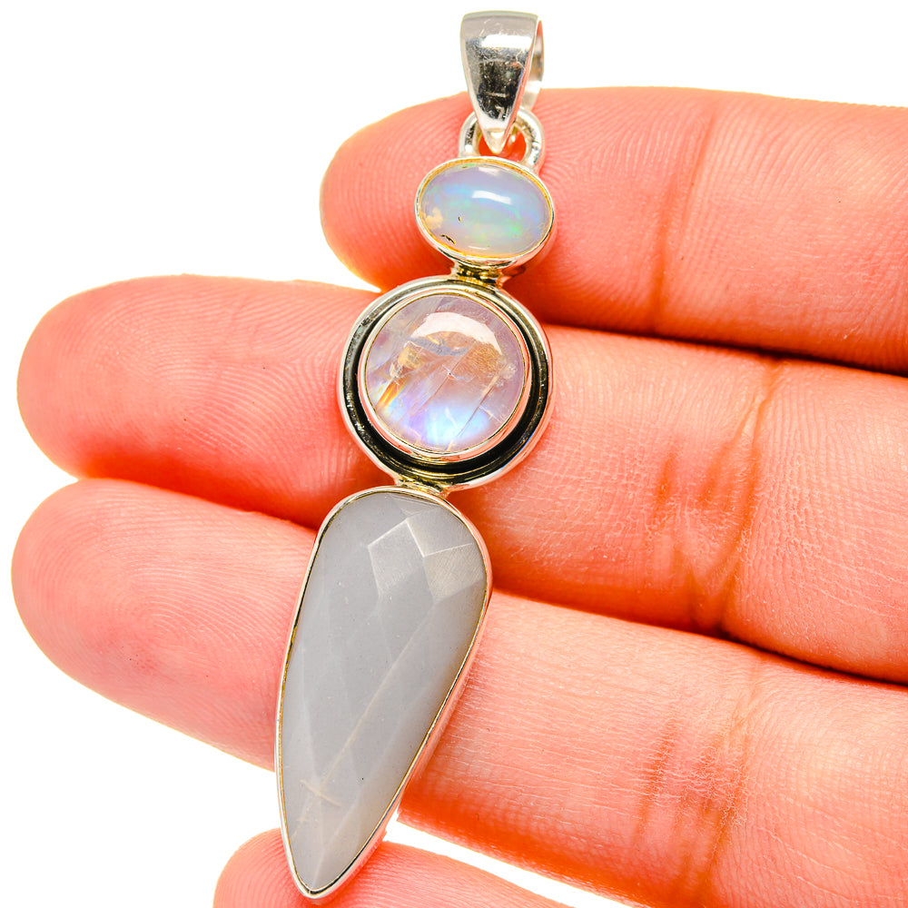 Moonstone pendant on 925 sterling silver bail, round opalescent top and teardrop bezel setting