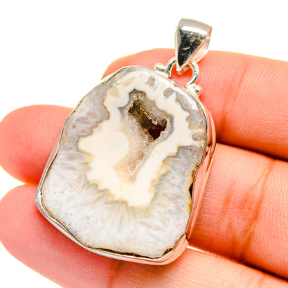 White geode slice pendant with polished 925 sterling silver bezel and top bail
