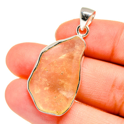 Libyan Desert Glass pendant in silver bezel, teardrop orange-yellow stone