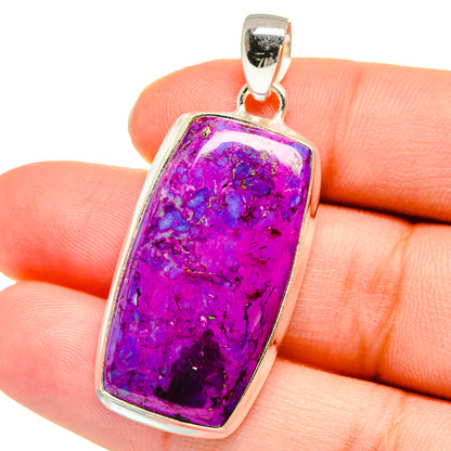 Purple turquoise pendant with rectangular silver frame and loop bail, close-up