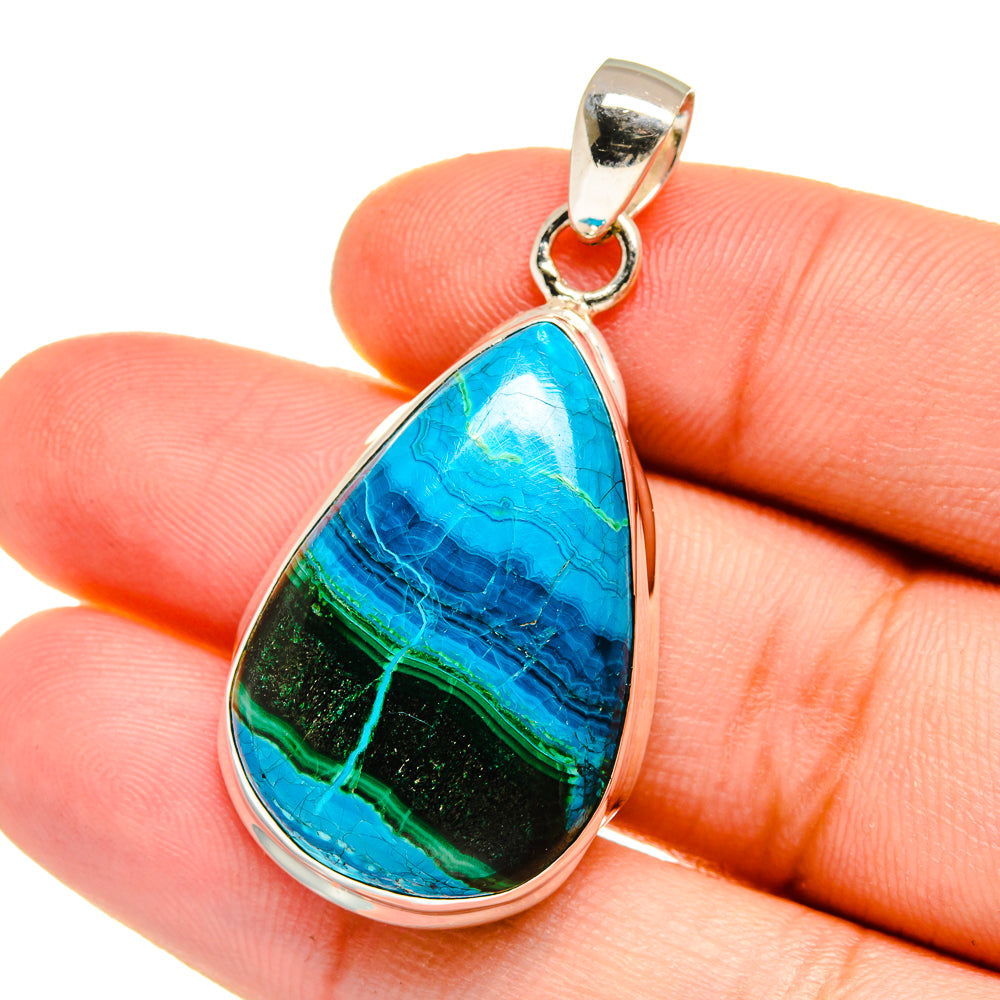Sterling silver teardrop pendant with blue-green chrysocolla-style stone and loop bail