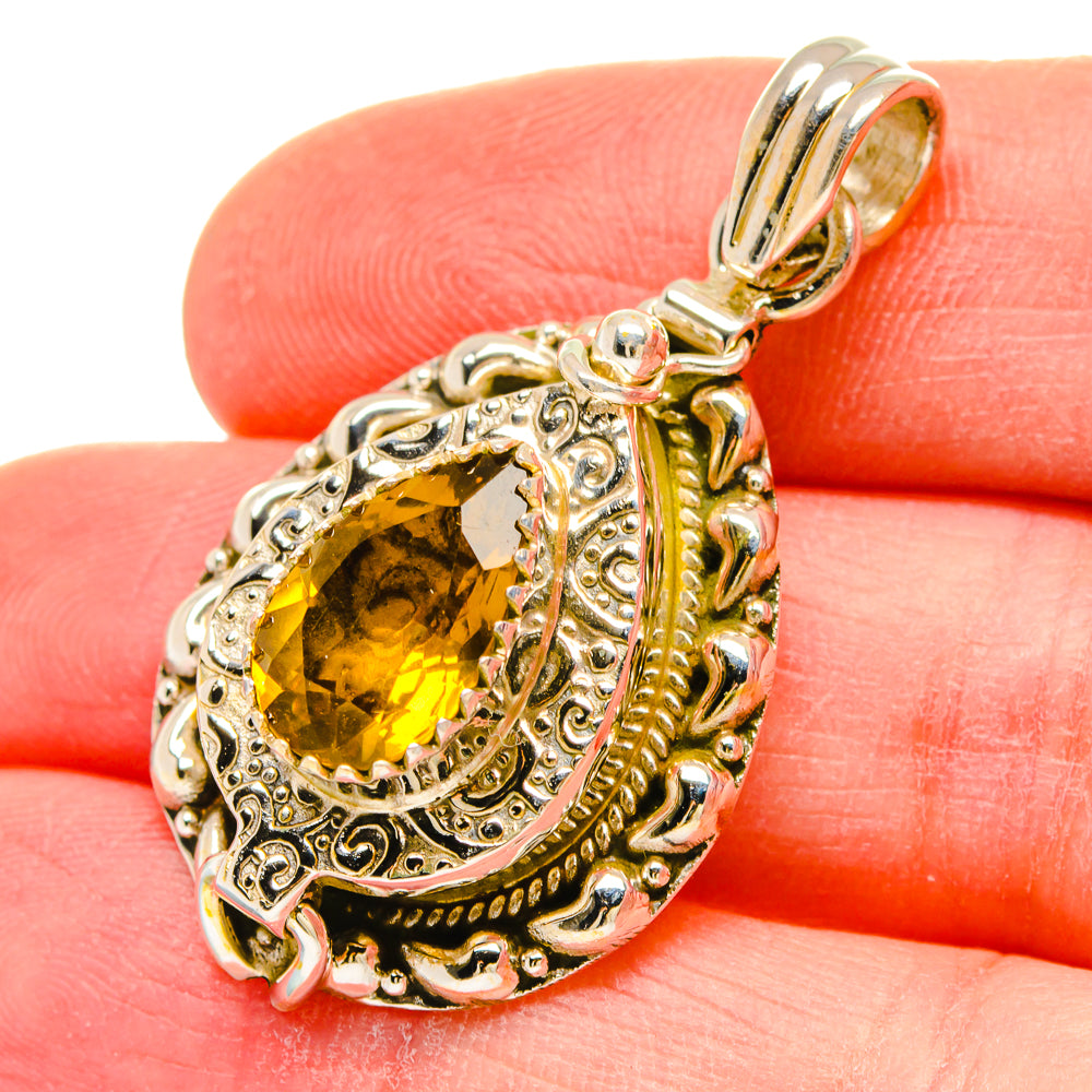 Faceted citrine pendant with ornate 925 sterling silver filigree setting