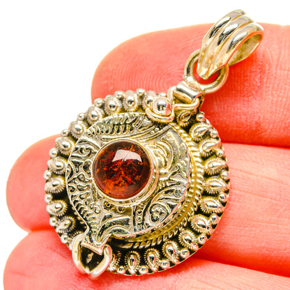 925 sterling silver garnet pendant with round red gemstone bezel and bail loop