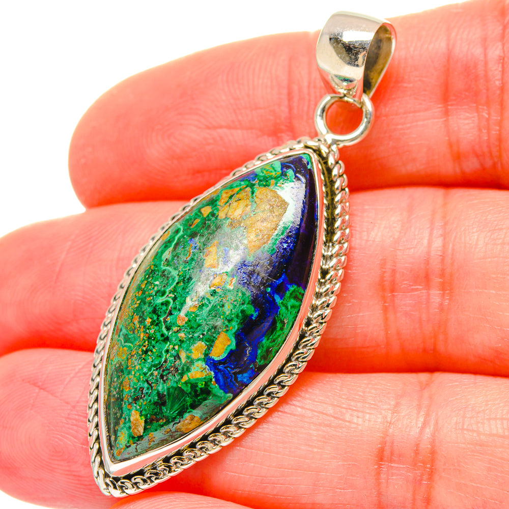 Oval gemstone pendant in sterling silver, green-blue stone with polished bail loop