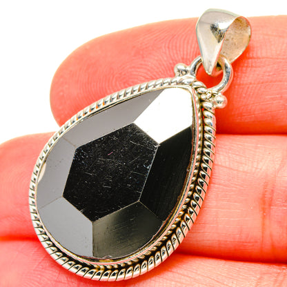 Hematite teardrop pendant in 925 sterling silver with textured edge and loop bail
