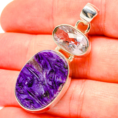Sterling silver pendant close-up with clear kunzite bezel and purple charoite cabochon
