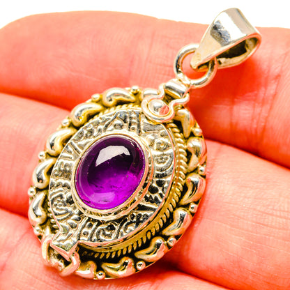 Amethyst purple pendant in 925 sterling silver, ornate round bezel and bail