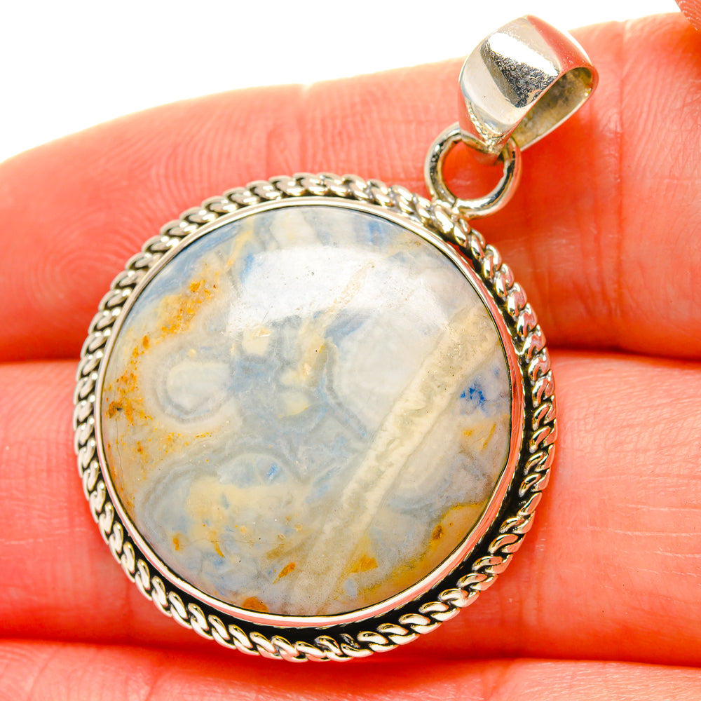 Blue scheelite pendant in 925 sterling silver round bezel with bail and loop