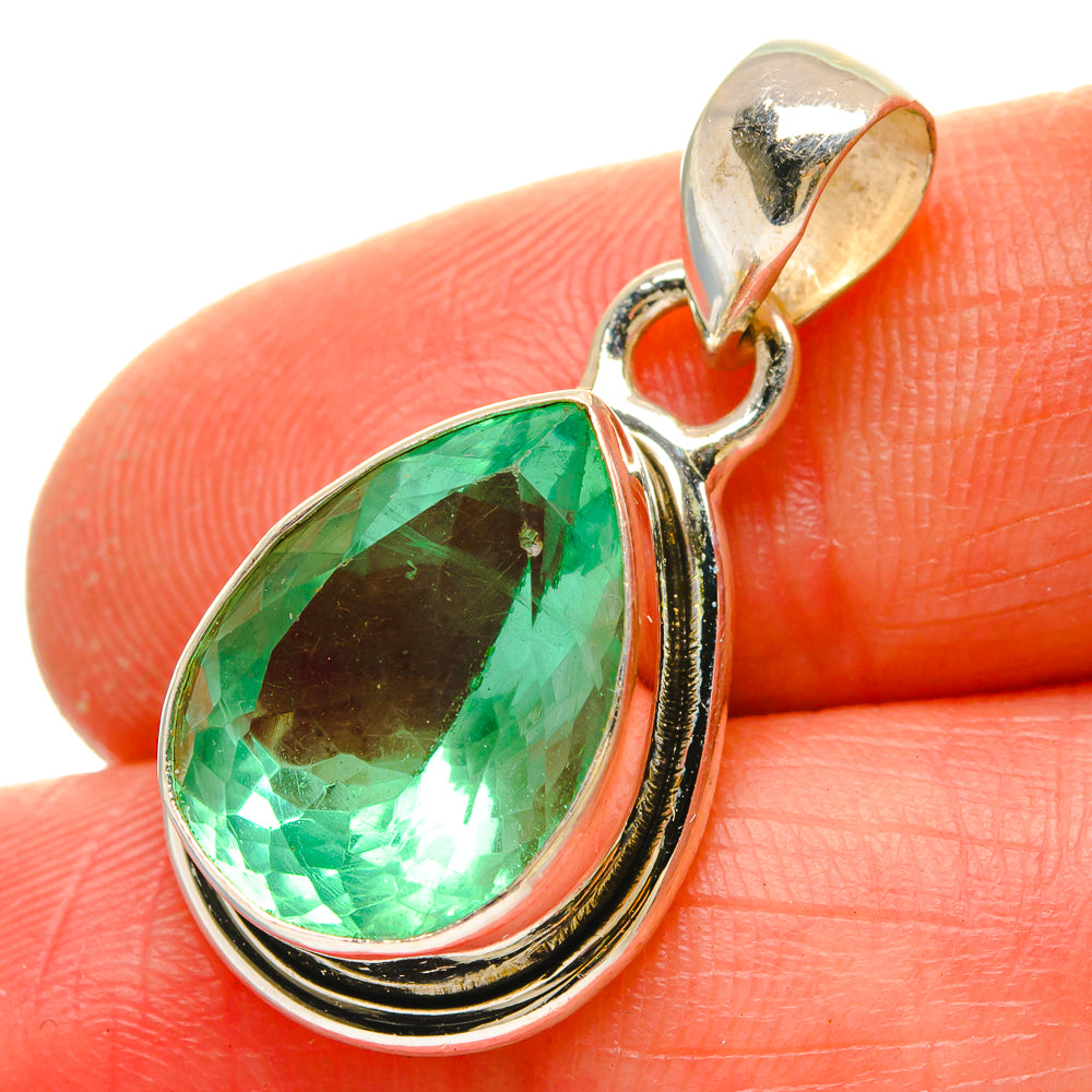 Green fluorite pear-drop pendant on sterling silver bail, faceted gem