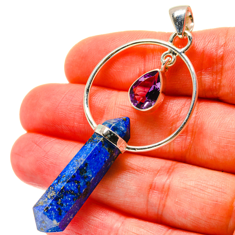 Sterling silver pendant on hand, blue lapis point with purple amethyst teardrop
