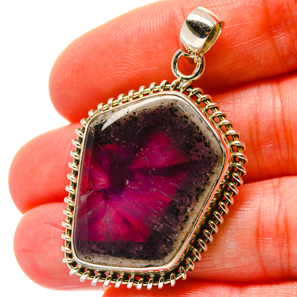 925 sterling silver pendant with purple crystal teardrop cabochon in rope bezel