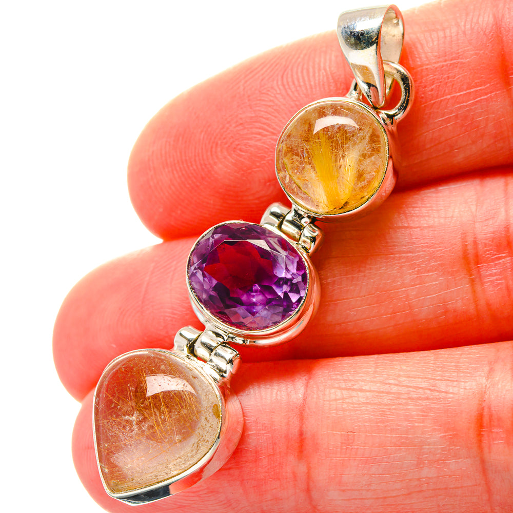 Three-stone gemstone pendant with yellow rutilated quartz and purple amethyst in silver