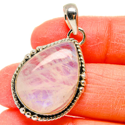 Teardrop moonstone pendant in silver bezel with bail, pink-purple iridescent stone