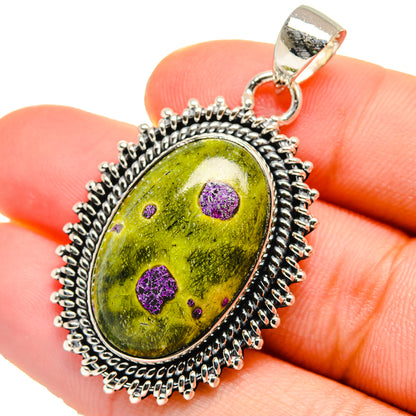 925 sterling silver Atlantisite pendant with green oval stone and purple speckles