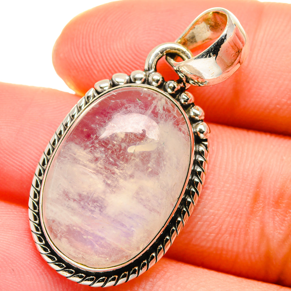 Oval pink-lavender moonstone pendant in 925 sterling silver with textured bail