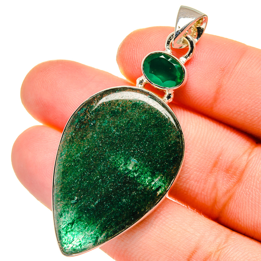 Green gemstone teardrop pendant with silver bezel and small green top bail