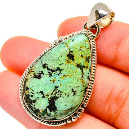 Turquoise teardrop pendant in 925 sterling silver bail, textured stone, bezel edge