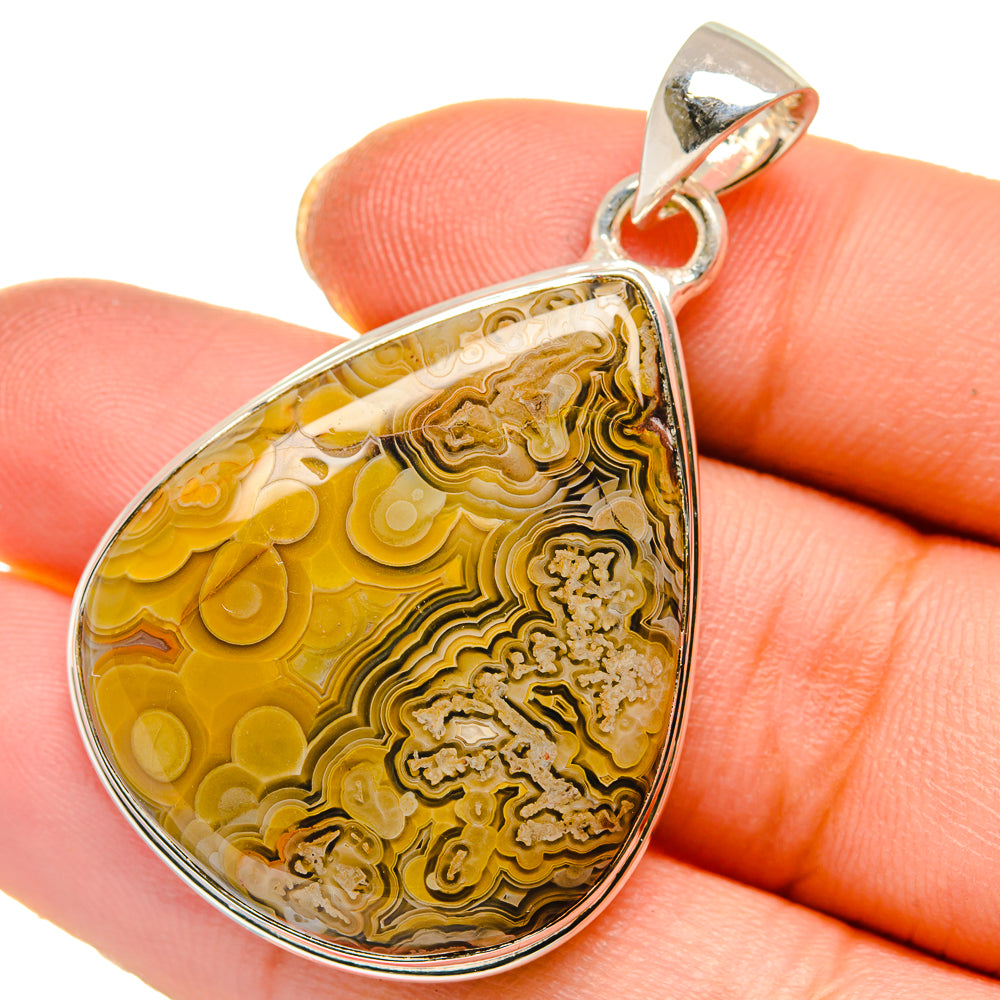 Ocean jasper teardrop pendant with sterling silver bezel and loop bail, close-up