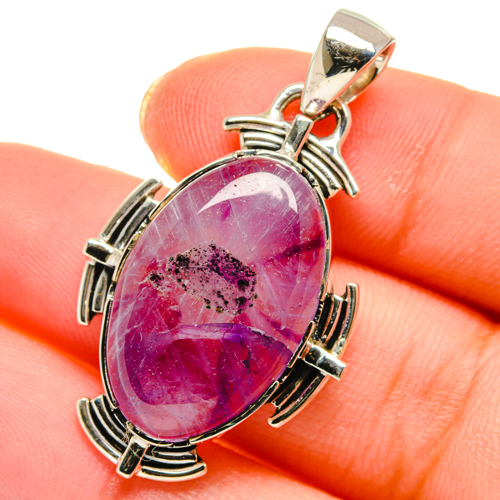 Oval amethyst pendant in 925 sterling silver with magenta cabochon stone and bail