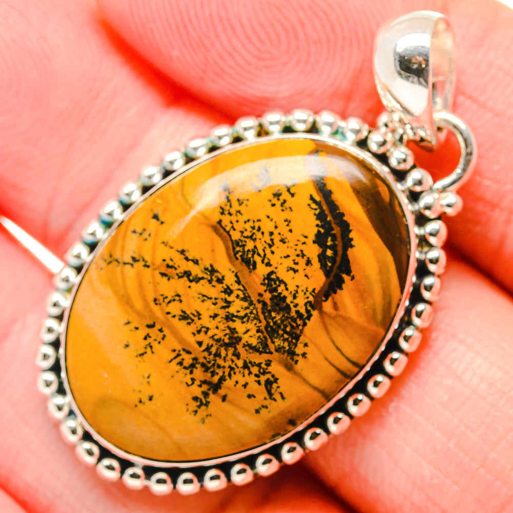 Picture jasper oval pendant close-up with beaded sterling silver setting and bail