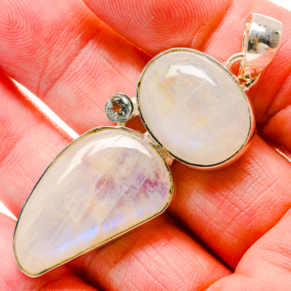 Sterling silver moonstone pendant with pear and oval cabochons, blue stone accent