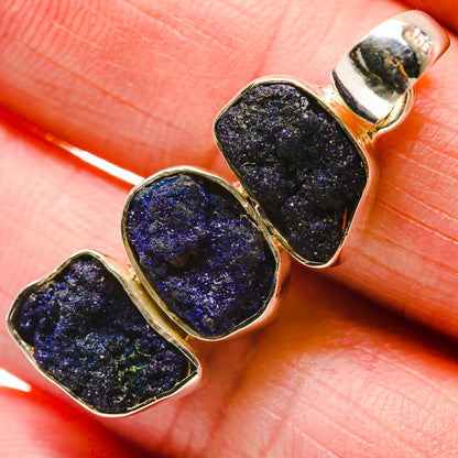 Rough lapis lazuli pendant with two dark blue stone slabs in sterling silver setting