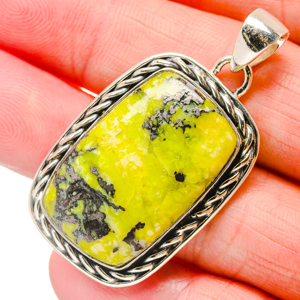 925 sterling silver opal pendant with bright yellow-green cabochon, ornate bezel