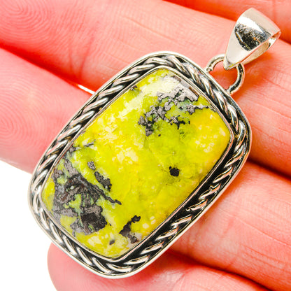 925 sterling silver opal pendant with bright yellow-green cabochon, ornate bezel