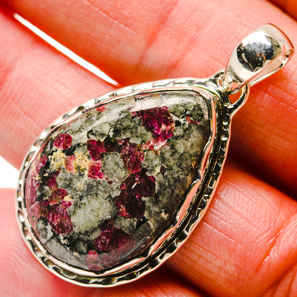 Russian eudialyte pendant in 925 sterling silver, teardrop cabochon with metal bail