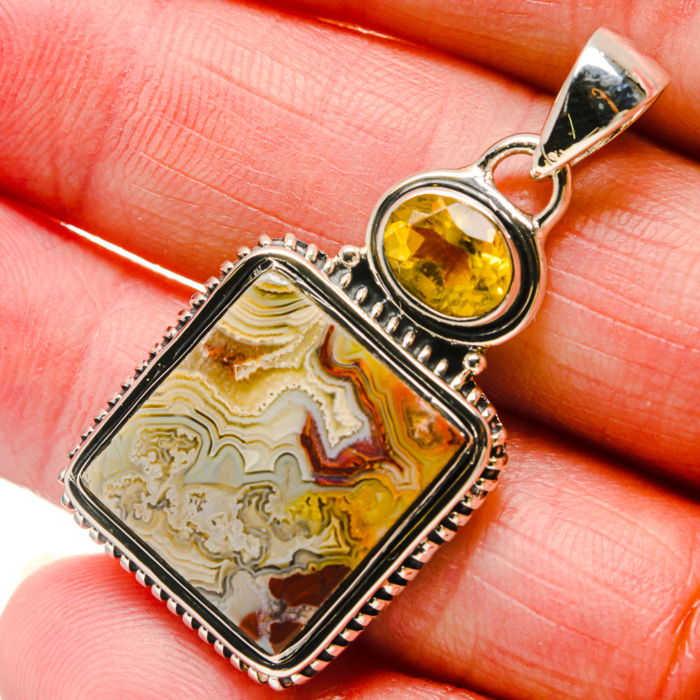Sterling silver pendant close-up, square lace agate with citrine stone bezel