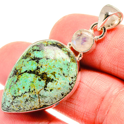 Sterling silver teardrop turquoise pendant with iridescent moonstone accents