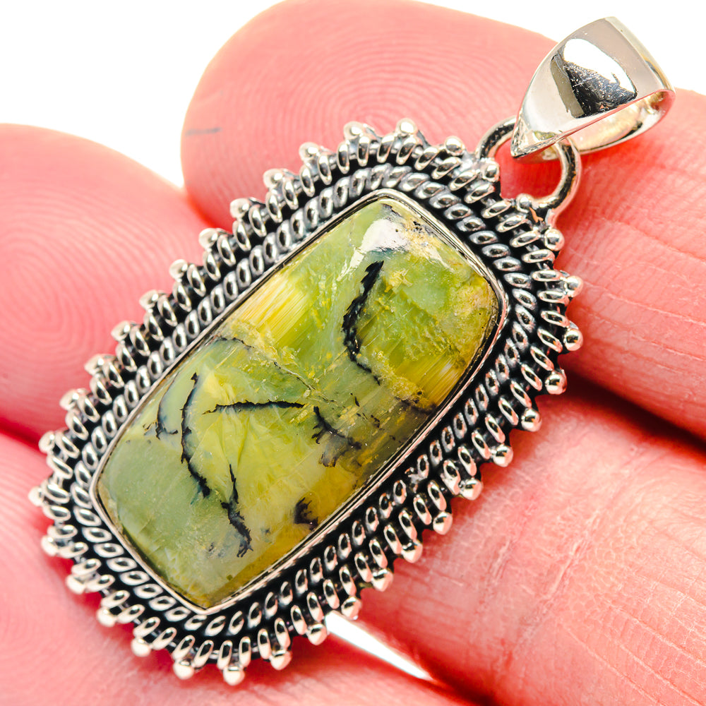 Rectangular green opal pendant in silver rope-edge frame, polished bail at top.