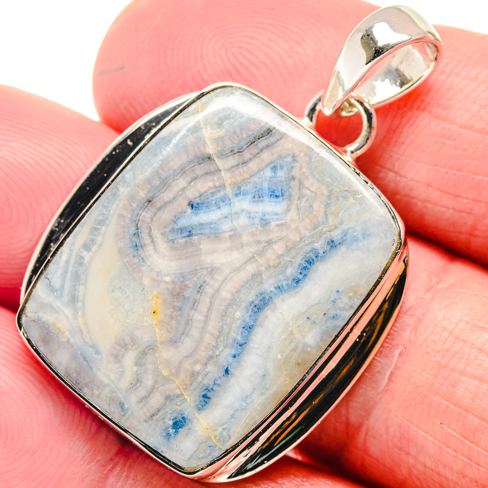 Sterling silver pendant with rectangular blue-and-white stone cabochon and top bail