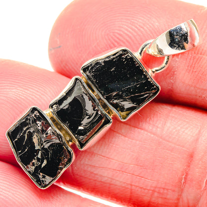 Rough shungite pendant with three dark stone squares in sterling silver bezel settings