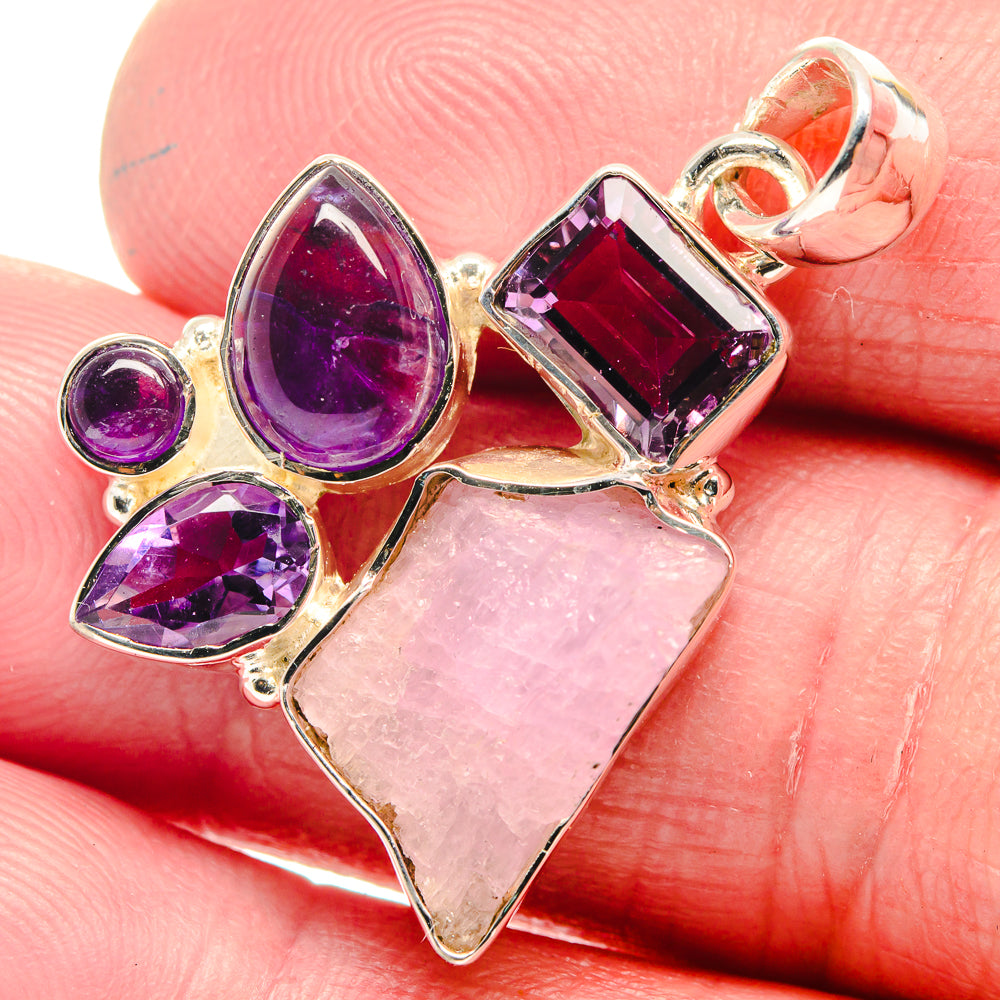 Sterling silver pendant close-up with rough rose quartz heart and purple amethyst marquise stones