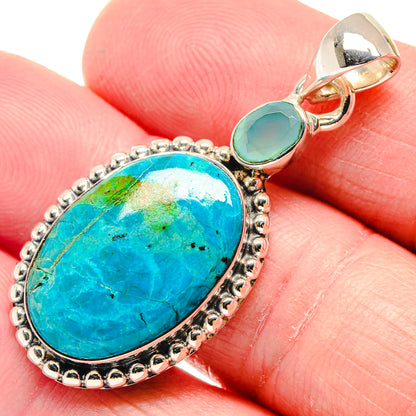 Close-up of 925 sterling silver aqua chalcedony pendant with oval cabochon and aqua drop stone