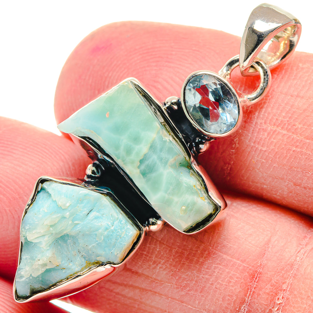 Larimar and blue topaz sterling silver pendant with round blue gemstone center