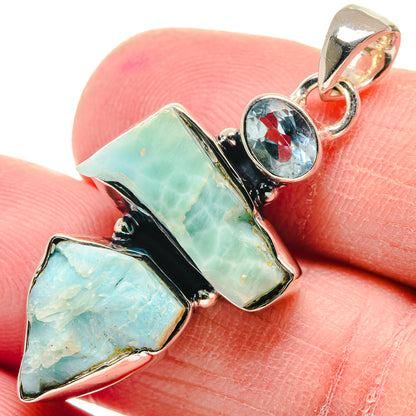 Larimar and blue topaz sterling silver pendant with round blue gemstone center
