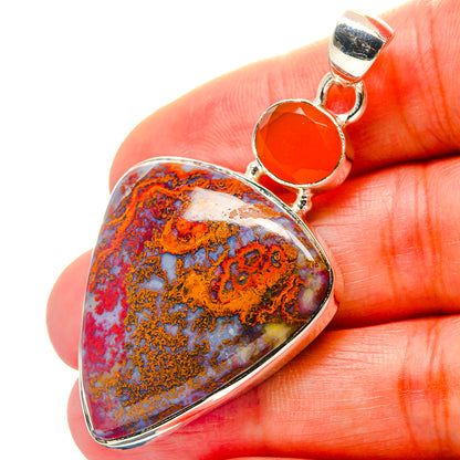 Sterling silver pendant with teardrop multicolor jasper and round orange cabochon
