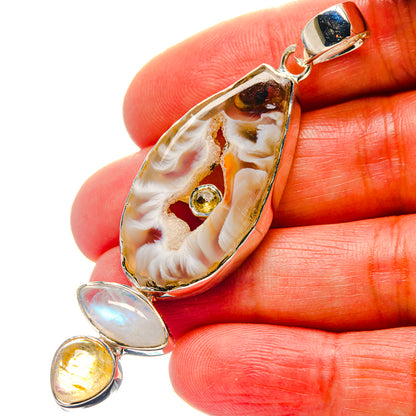 Teardrop geode slice pendant in sterling silver with opal and citrine accents