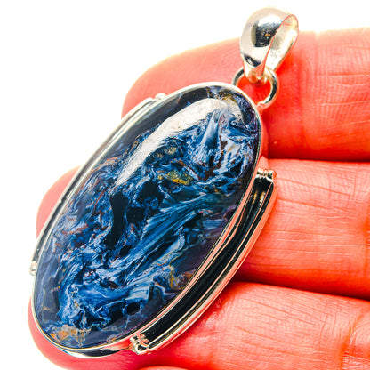 Sterling silver oval pietersite pendant with blue stone in bezel setting