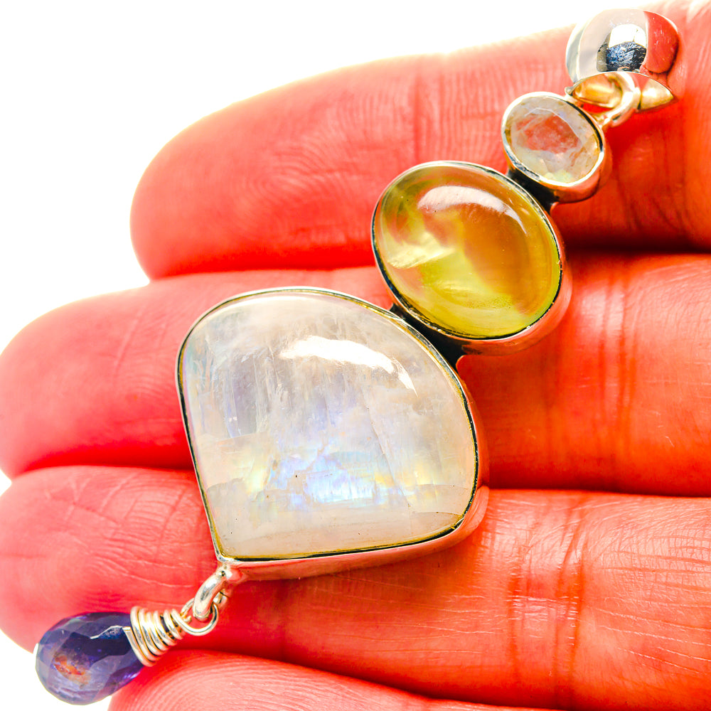 Sterling silver heart pendant with iridescent moonstone center and multicolor gemstones