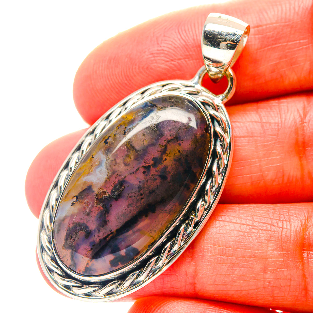 925 sterling silver oval agate pendant with ornate rope bezel; purple and black stone