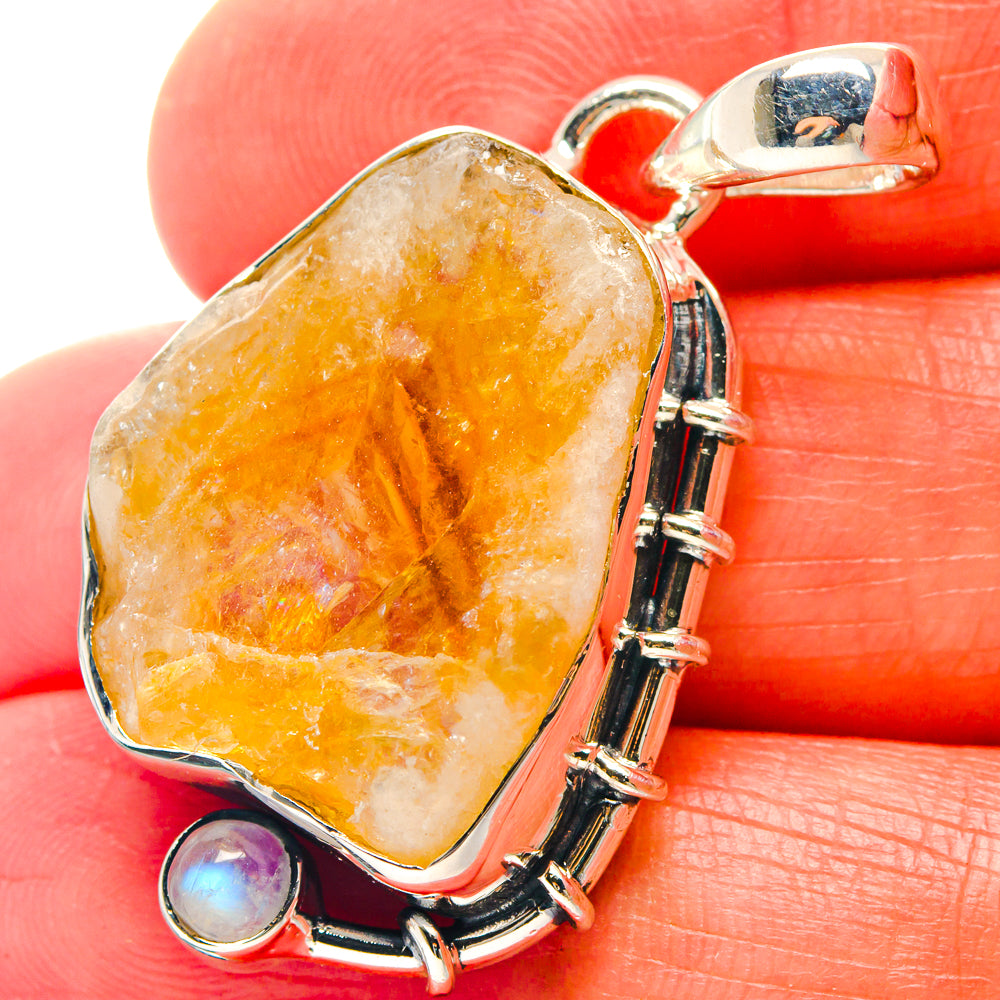 Rough citrine pendant with 925 silver links and two small round moonstone stones