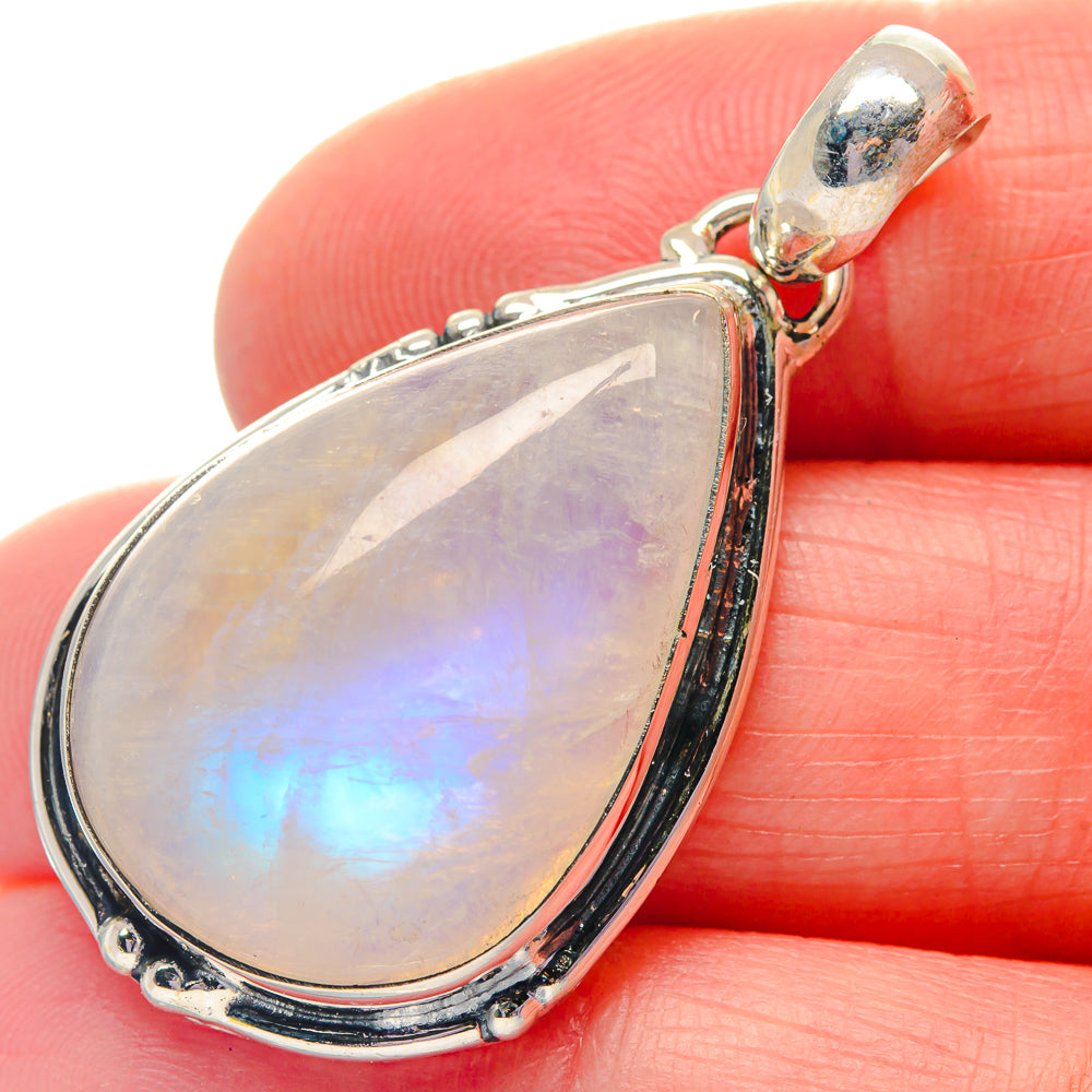 Teardrop moonstone pendant in polished 925 sterling silver, iridescent opalescent flash