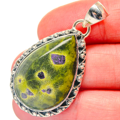 Atlantisite pendant in 925 sterling silver with teardrop green stone and purple speckles